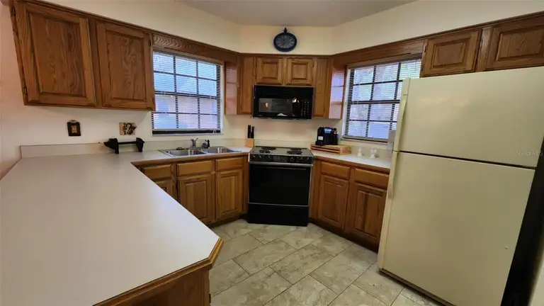 469 BLUE HERON CIR #469 — photo 2