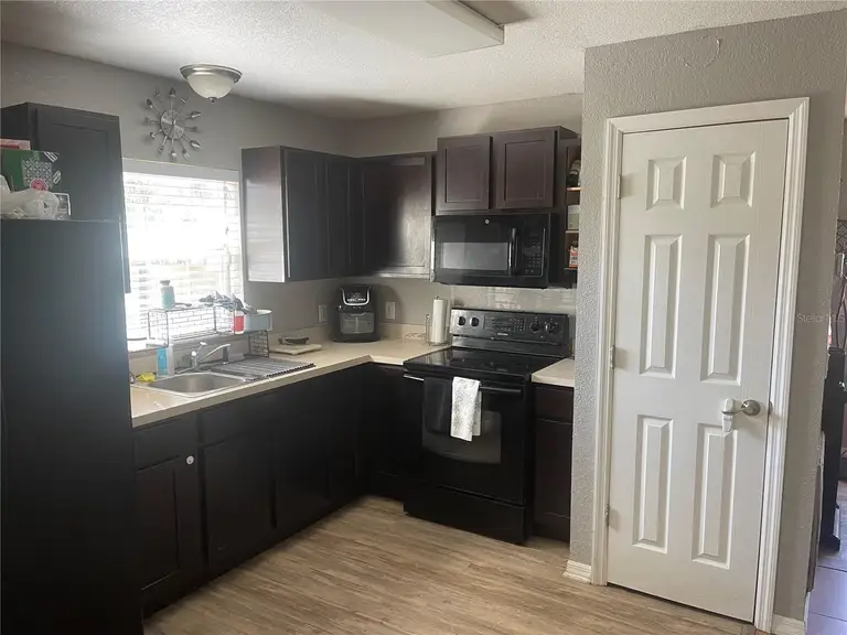 1678 SW HARLEM CIR — photo 2