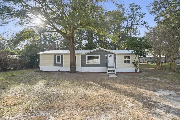 8560 NW 13TH CT