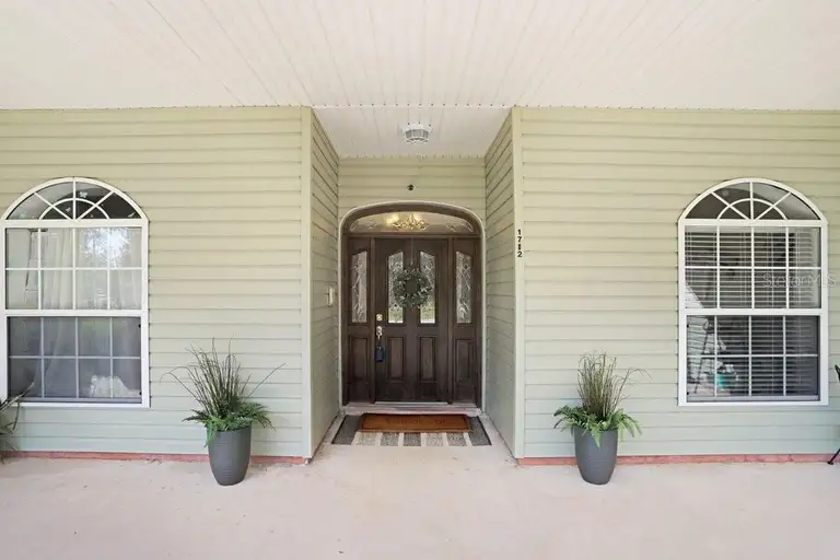 1702 W KNIGHTS GRIFFIN RD — photo 2