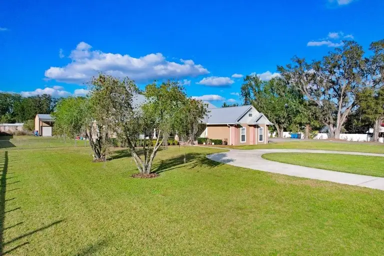 1702 W KNIGHTS GRIFFIN RD — photo 3