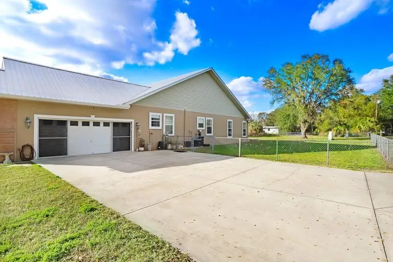 1702 W KNIGHTS GRIFFIN RD — photo 4