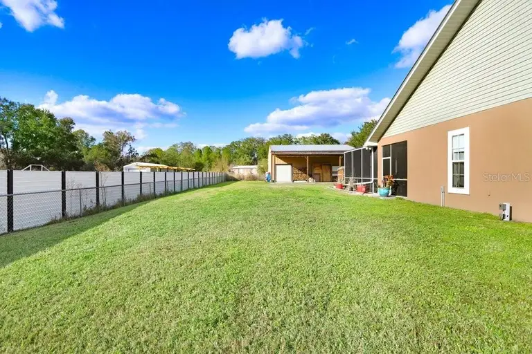 1702 W KNIGHTS GRIFFIN RD — photo 5