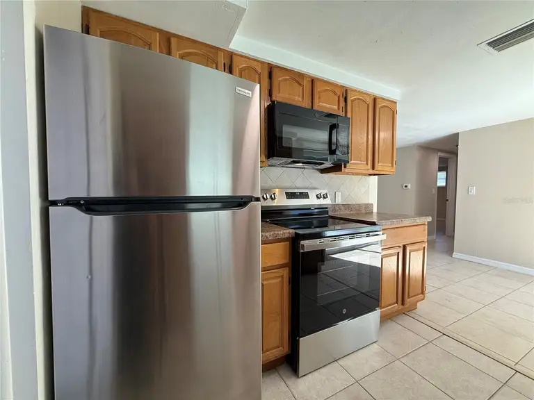 7138 ASHWOOD DR — photo 4