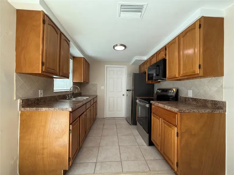 7138 ASHWOOD DR — photo 5