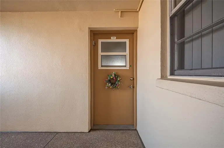 7465 BAY ISLAND DR S #318 — photo 3