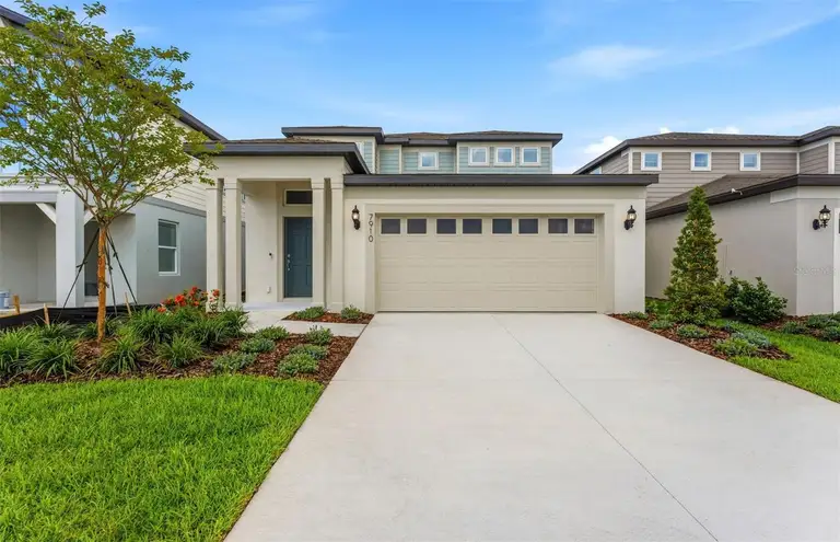 7910 PALM PARADISE PL