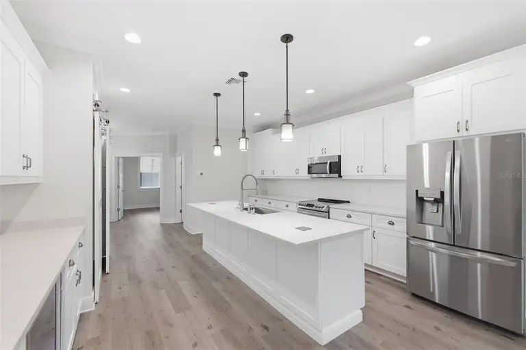 1225 SAVONA DR NE — photo 3