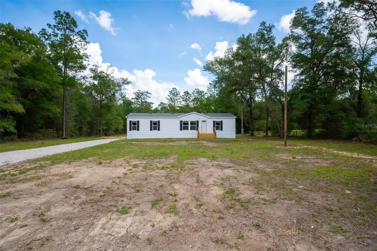 6951 NE 104 CT — photo 2