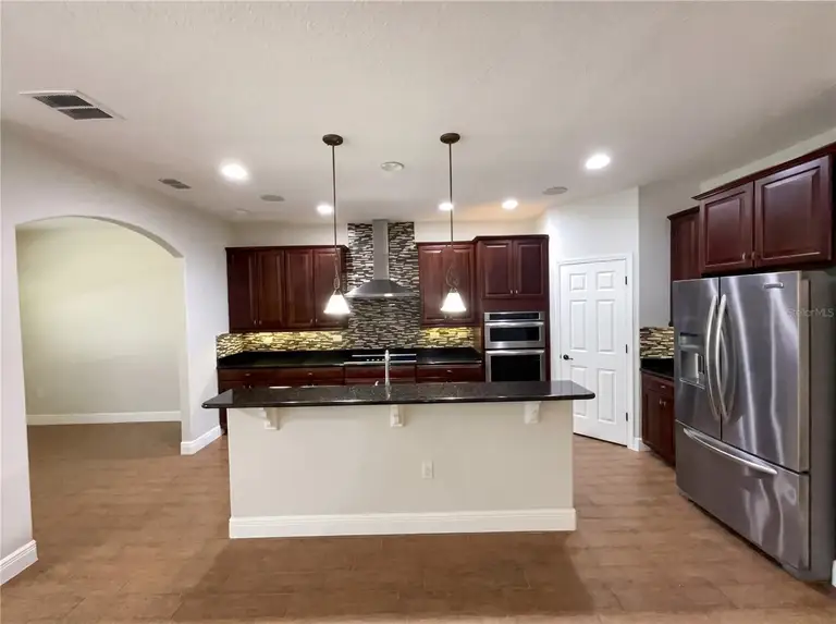 8715 QUIET MEADOWS TRL — photo 2