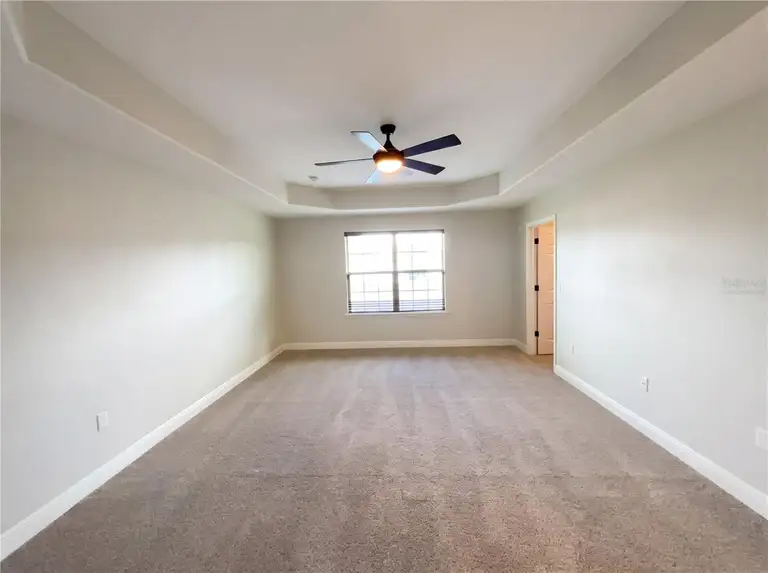 8715 QUIET MEADOWS TRL — photo 4