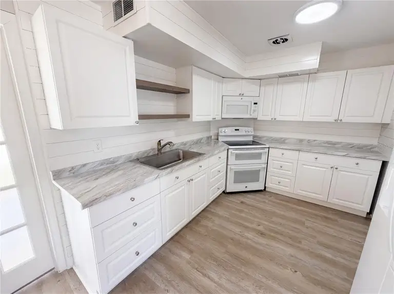 7328 TANGELO AVE — photo 2