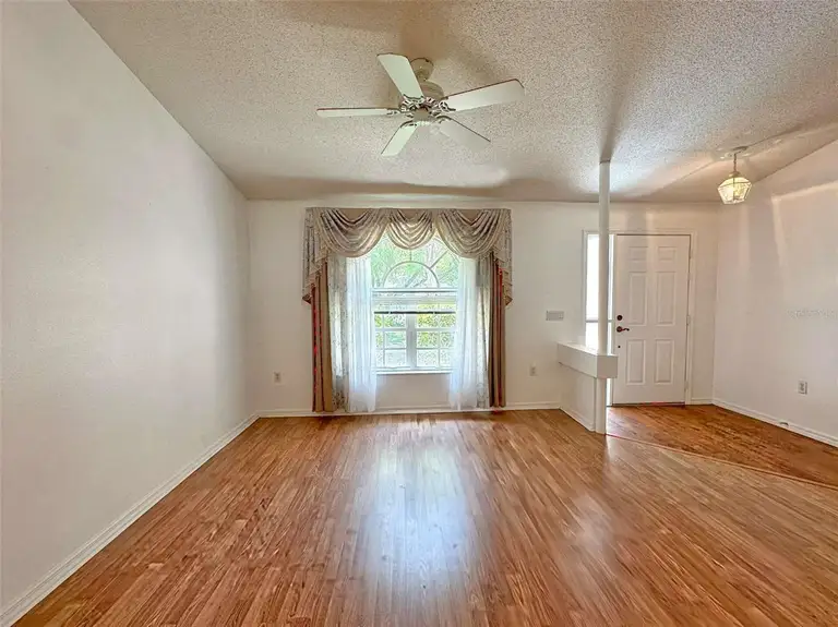 8421 PEORIA ST — photo 4